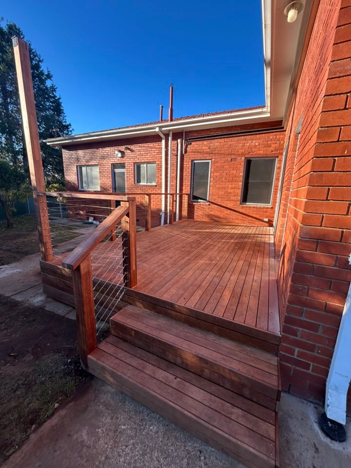 Timber deck and pergola structure at sunset